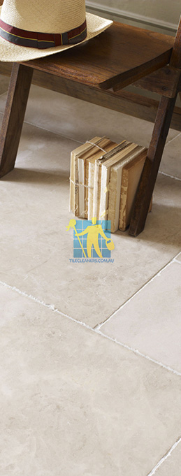 limestone tile sample storm tumbled white grout wooden chair sealing
