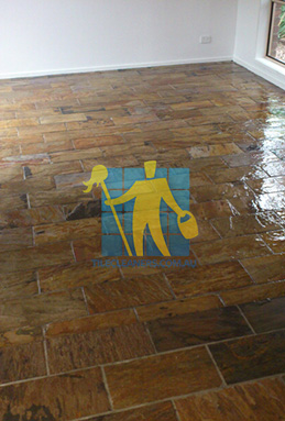 large bedroom with slate tiles after sealing with glossy sealer empty room regular pattern Sydney