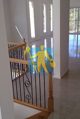terrazzo tiles empty living room timber staircase indoor house 