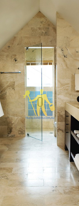 travertine tiles bathroom floor wall shower with dark veining Sydney